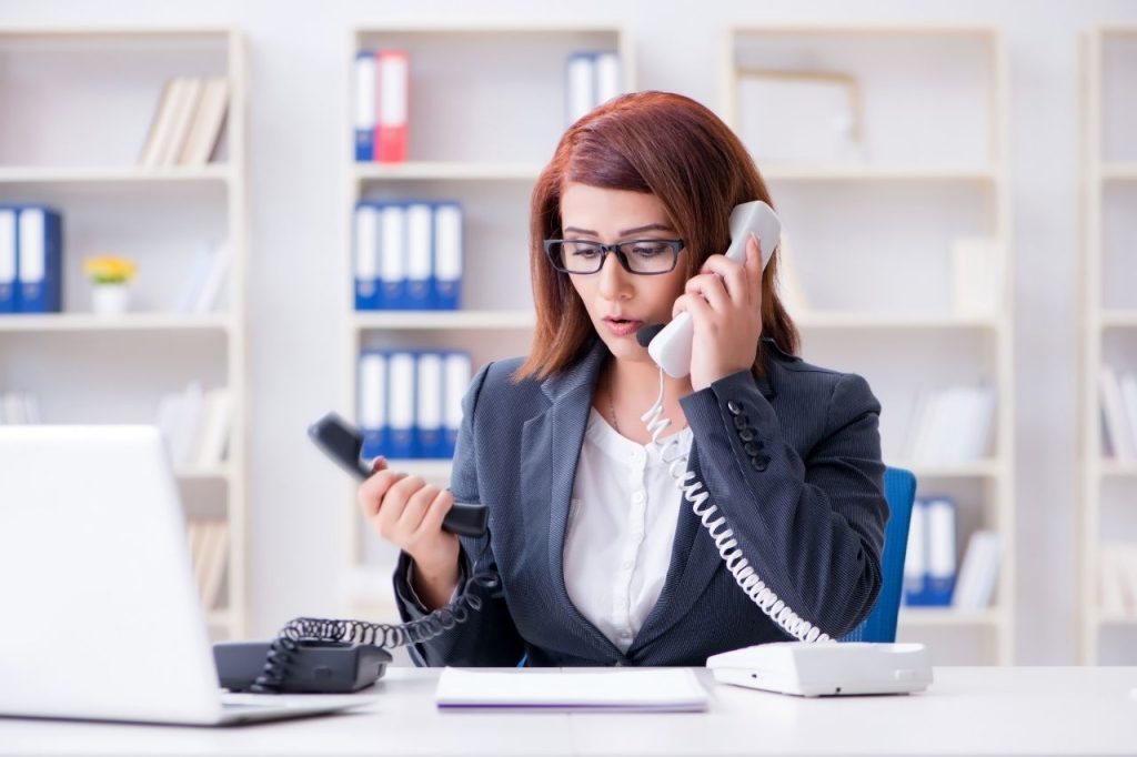 Phone Assistance Lady assisting clients through phone calls.
